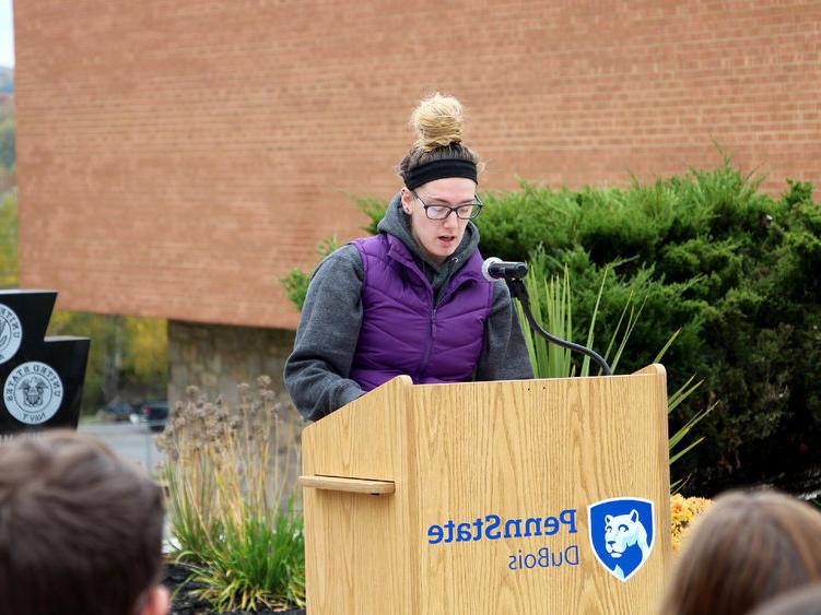Fourth year student Cierra Hoffman shares one of the testimonials during the victimology event at Penn State DuBois.